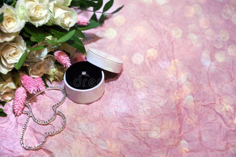Top View Engagement Ring in a Round White Box on a Pink Paper Background with Bokeh and with a Bouquet of White Roses Stock Photo - Image of love, bridal: 136551494 Top View Engagement Ring in a Round White Box on a Pink Paper Background with Bokeh and with a Bouquet of White Roses Stock Photo - Image of love, bridal: 136551494