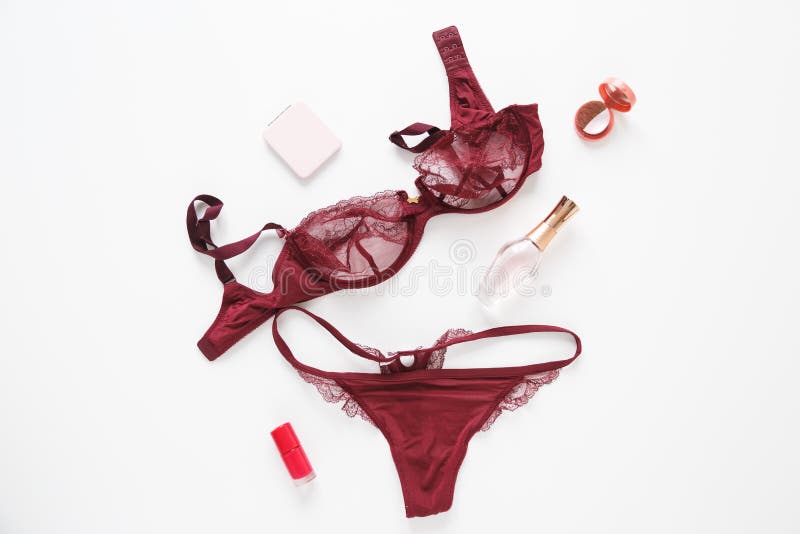 Top view fashion red lace lingerie and perfume bottle. Women`s accessory and underwear on flat lay. Top view fashion red lace lingerie and perfume bottle. Set royalty free stock photography Top view fashion red lace lingerie and perfume bottle. Women`s accessory and underwear on flat lay. Top view fashion red lace lingerie and perfume bottle. Set royalty free stock photography