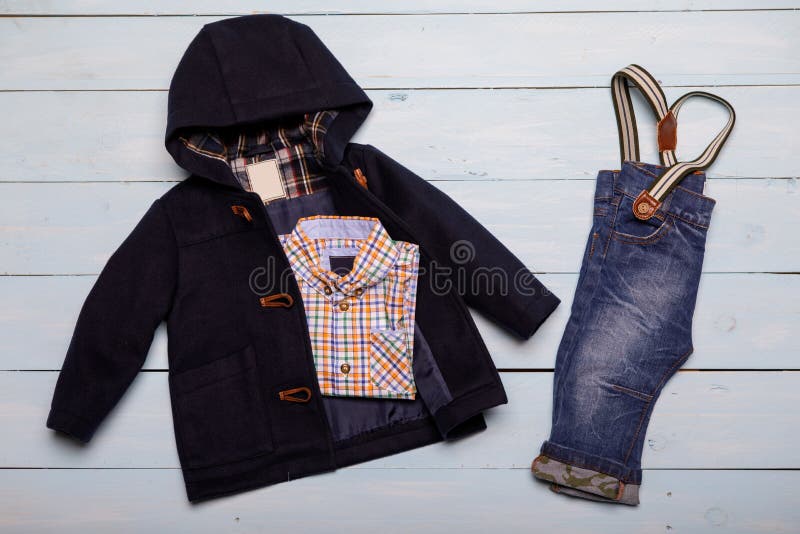 https://thumbs.dreamstime.com/b/top-view-fashion-trendy-look-kids-clothes-103930087.jpg