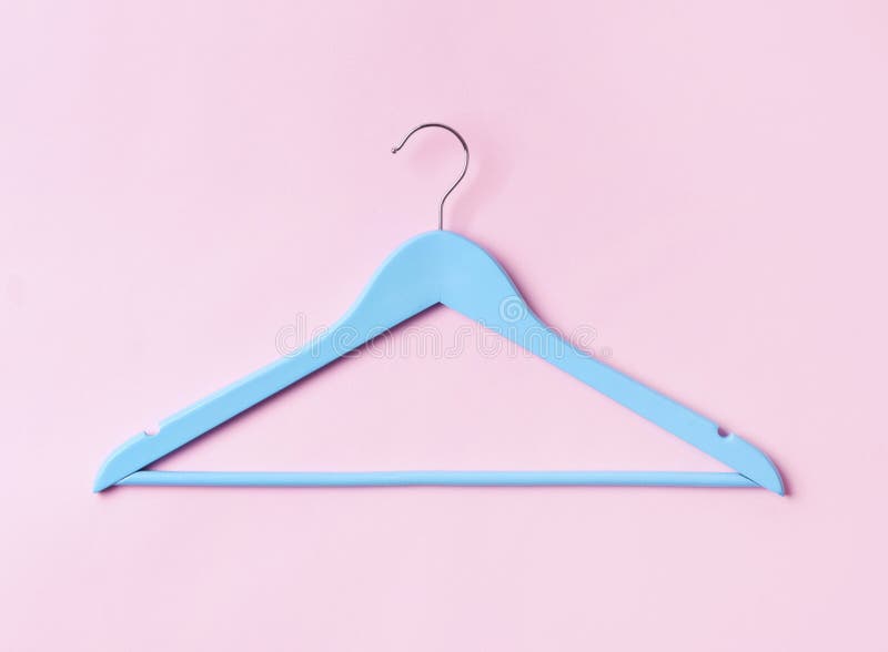 Top View Flat Lay Single Blue Wooden Hanger Pink Pastel Background
