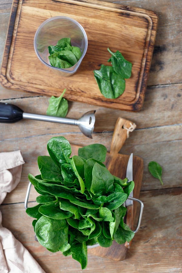 Top View Fresh Bunch Spinach Leaves With Blender For Cooking Sau Stock