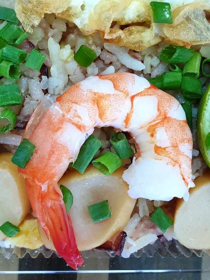 Top View of Fried Rice with Shrimp, Sausage Sprinkled with Scallion