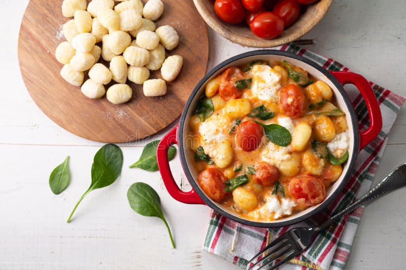 Top View of Gnocchi in Creamy Tomato Sauce with Spinach and Melted