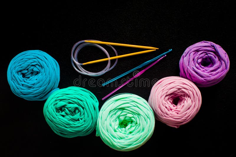 Top view heap of textile yarn balls. Group, colorful.