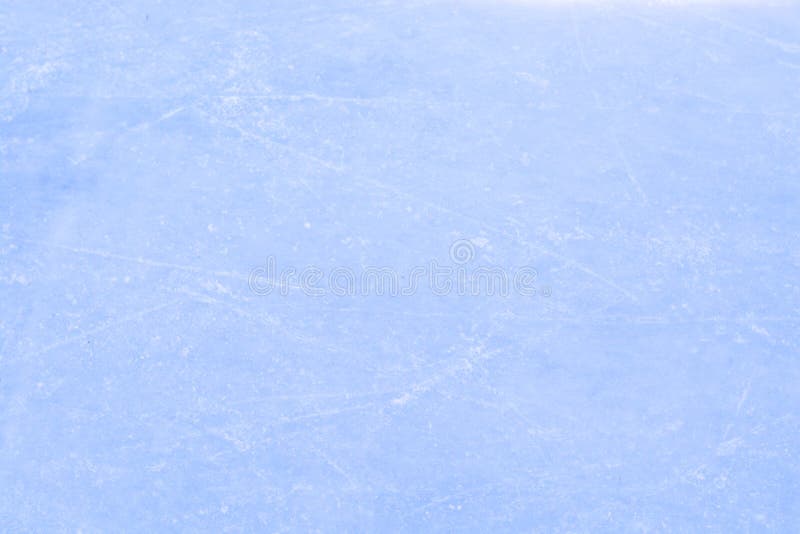 Top view of ice hockey or skating rink with traces from skates