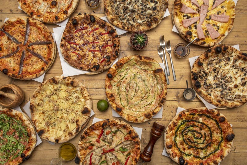 Top view image of pizzas a flat bread, usually circular in shape, made royalty free stock image