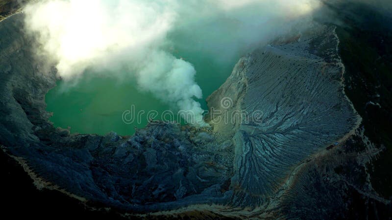 Top view inside a volcano which is erupting in the Java island in Indonesia stock photo