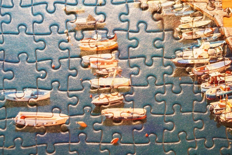 Top View of Jigsaw Puzzle Pieces Making a Port Editorial Stock Photo