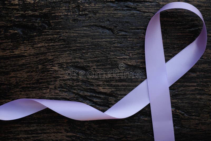 Lilac Ribbon On White Background. Cancer Concept Stock Photo, Picture and  Royalty Free Image. Image 110059751.
