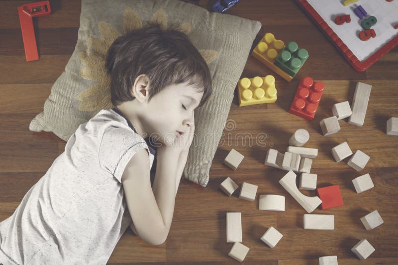 Little Boy Playing with Color Toys on Floor Stock Photo - Image of  bulldozer, little: 19039326