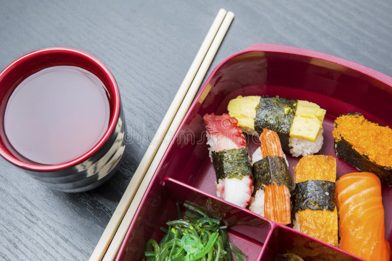 Lunch box served with soy sauce and chopsticks royalty free stock photography Lunch box served with soy sauce and chopsticks royalty free stock photography