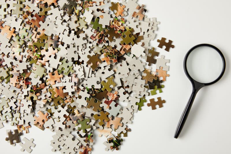 Magnifying Jigsaw Puzzle stock image. Image of network 1626871