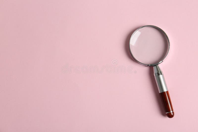 Top View of Magnifying Glass on Background, Space for Text. Search