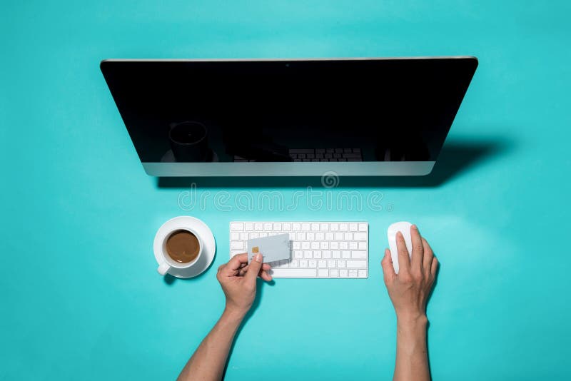 Top view of male hands making online payment stock photos