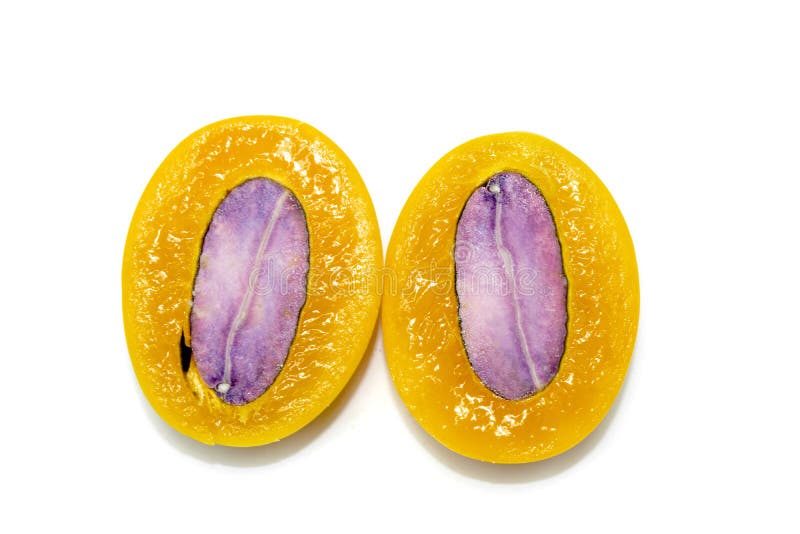 Top View of Marian Plum or Plum Mango Cut in Half this is Thai Fruit in Studio Shot on White