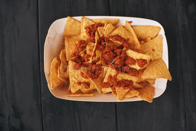 Top view of mexican food dish nachos con carne. The concept of Mexican cuisine.