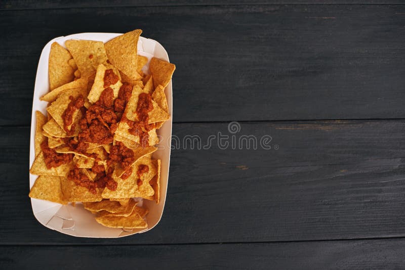 Top View Of Mexican Food Dish Nachos Con Carne. The Concept Of Mexican Cuisine.