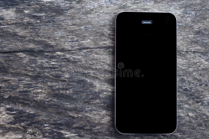 Top View of Mockup Black Screen Mobile Smartphone on Blank Old