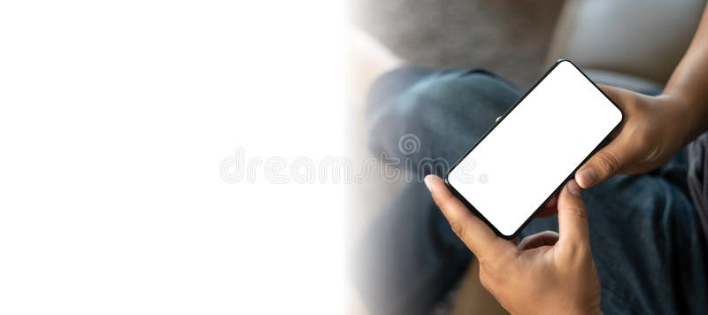 Top view Mockup image hand using a smartphone man Holding Cell Phone With Blank Screen royalty free stock photo