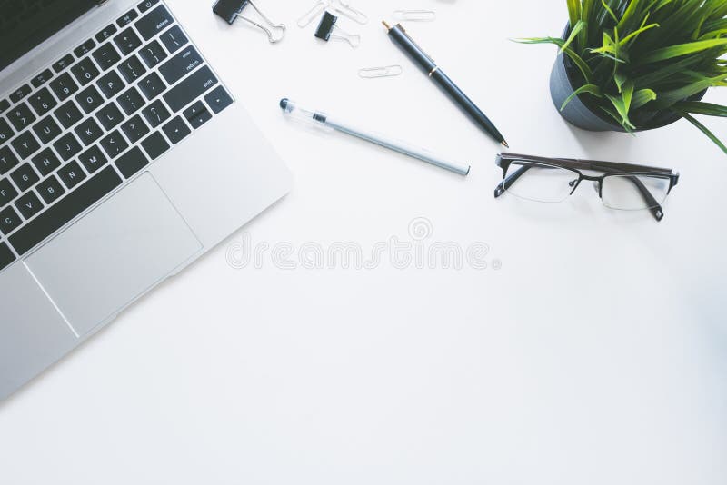 Top view of modern work space office desk table with computer