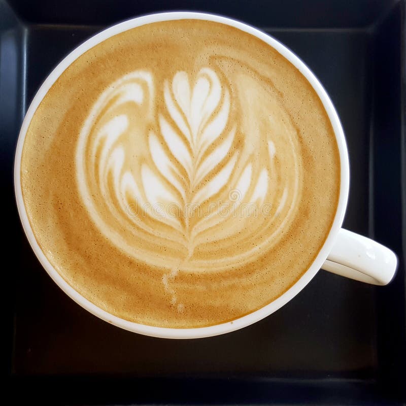 Top View of a Mug of Latte Art Coffee. Stock Photo - Image of style