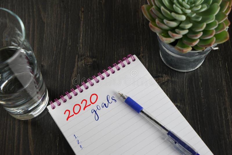 Top view of notebook with text 2020 goals and to do list royalty free stock images Top view of notebook with text 2020 goals and to do list royalty free stock images