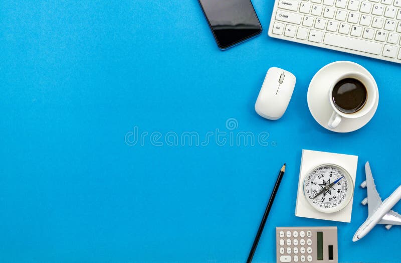 Top view of Office desk table of Business workplace and business objects on blue background copy space for your text stock images Top view of Office desk table of Business workplace and business objects on blue background copy space for your text stock images