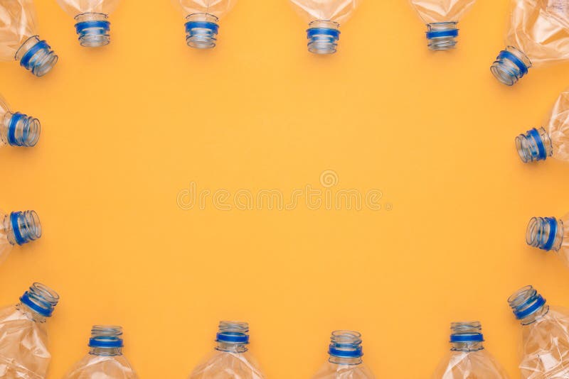 Top View Old Clear Plastic Water Bottle on Yellow Stock Photo Image