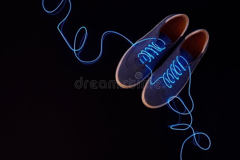 Download Top View Of A Pair Of Suede Sneakers With Neon Laces On ...