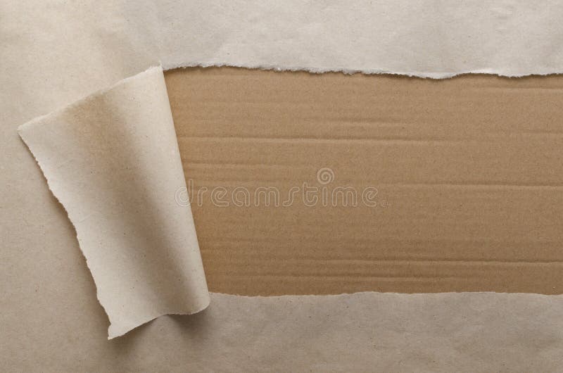 Top view of paperboard, wrapping torn craft paper.Empty space for design royalty free stock photos Top view of paperboard, wrapping torn craft paper.Empty space for design royalty free stock photos