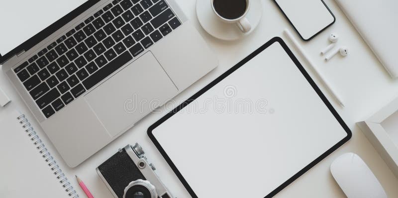 Top View Of Photographer Workplace With Blank Screen Tablet Laptop