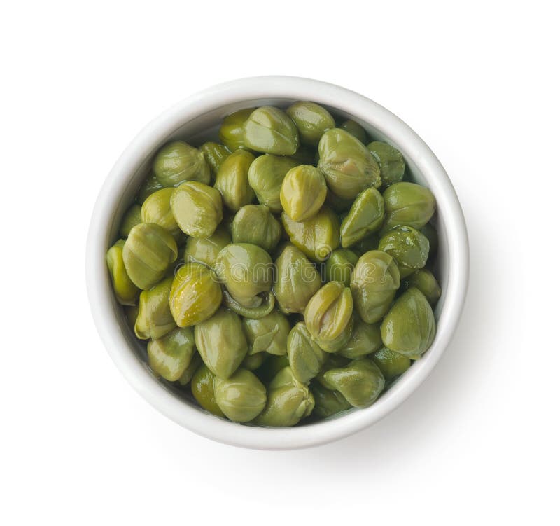 Top view of pickled capers in ceramic bowl stock photography