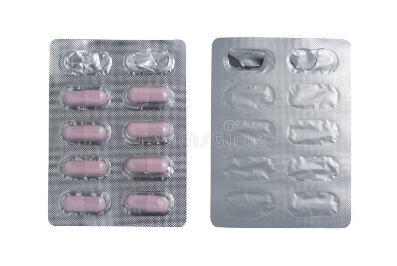 Top view of pink capsules in blister pack isolated on white with clipping path. Clear closeup view stock images, royalty-free photos and pictures