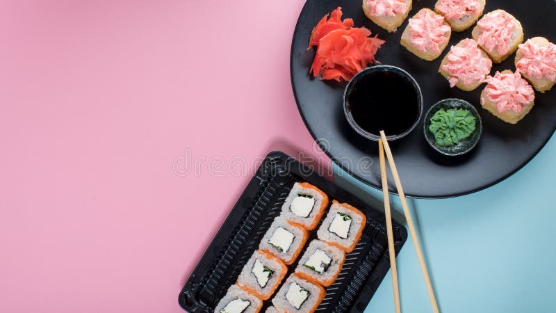 Top view on the plate of rolls with pink cream and Philadelphia roll royalty free stock images Top view on the plate of rolls with pink cream and Philadelphia roll royalty free stock images