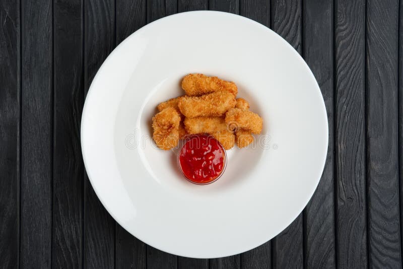Deep fried chicken nuggets stock image. Image of gold 186992981