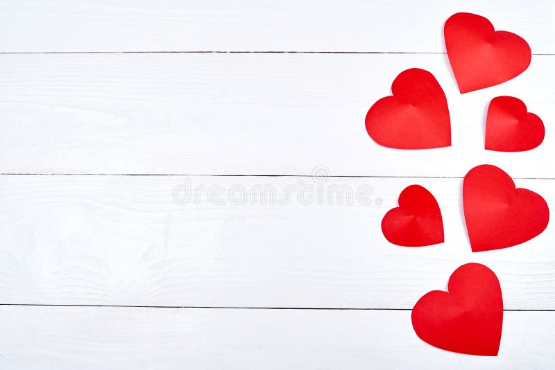 Top view of red paper hearts border on white wooden background, copy space for text. Greeting card mockup for Saint Valentines Day stock photos Top view of red paper hearts border on white wooden background, copy space for text. Greeting card mockup for Saint Valentines Day stock photos