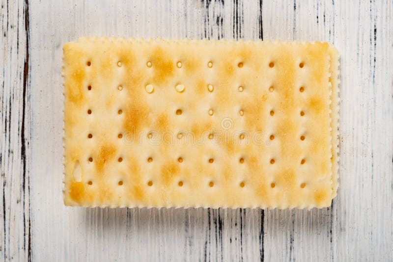 Sandwich biscuits on white wood background