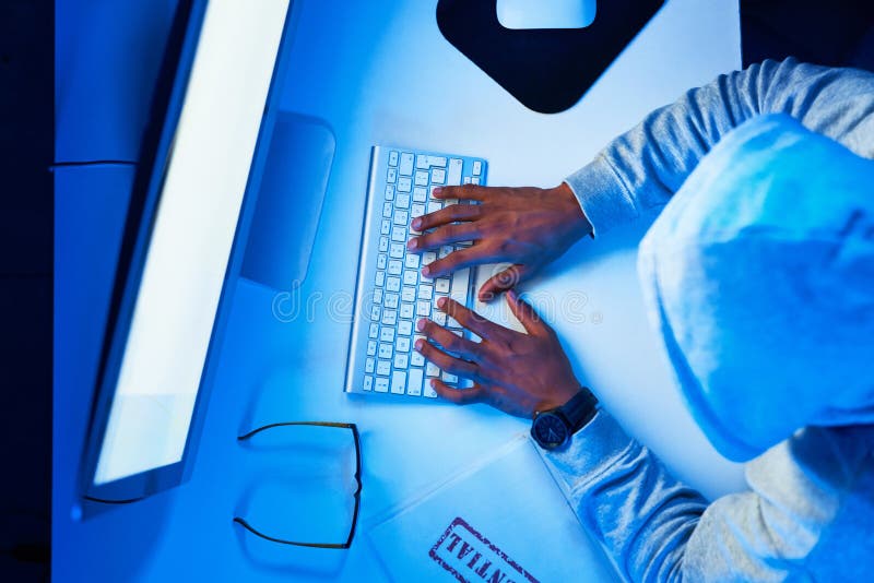 Top view, screen or man hacking computer for cybercrime, malware or phishing for stealing online data. Hacker, hoodie royalty free stock photos