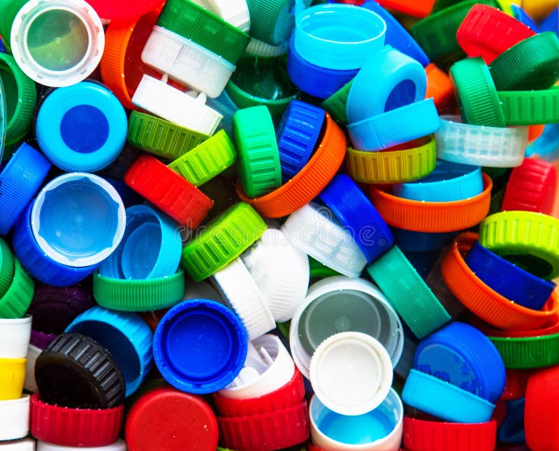 Top view shot of a heap of plastic lids for recycling stock images