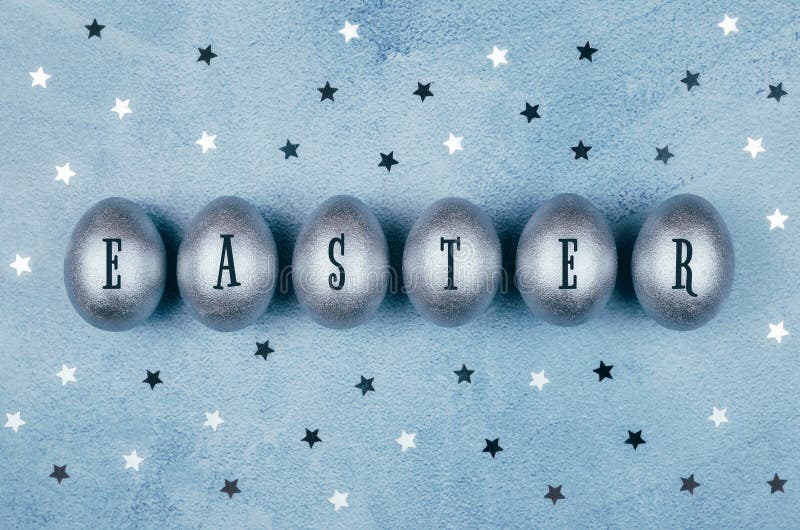Silver Colored Easter Eggs in a Row and Stars on Blue Textured