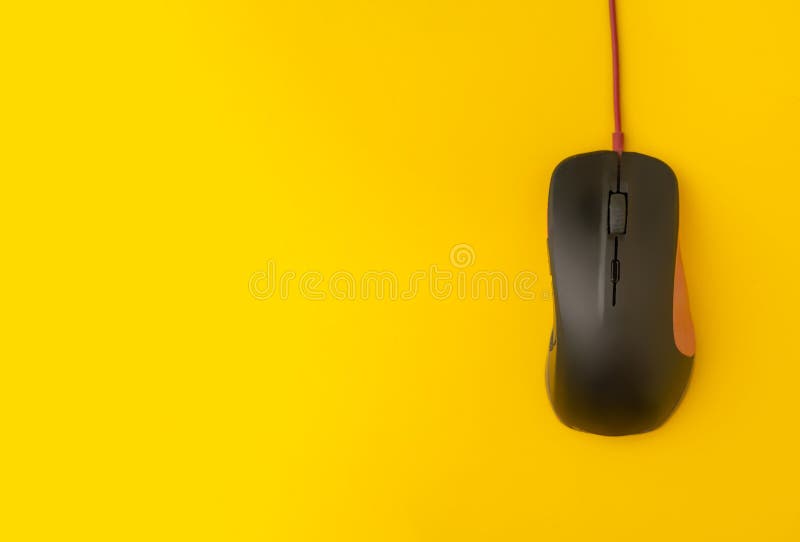 Top view of the simple computer mouse on the color background with copy space, minimalist concepts stock images