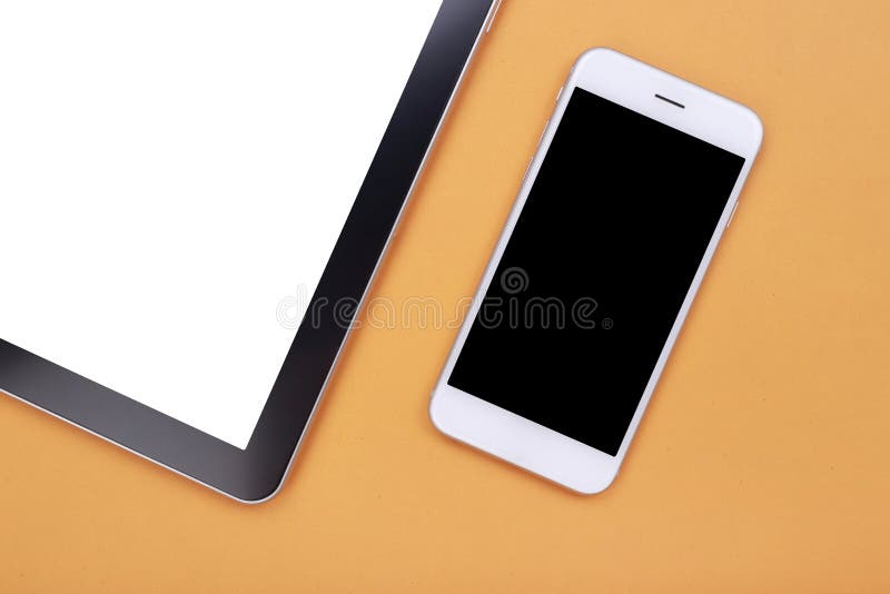 Top view smartphone and tablet on pastel background stock image