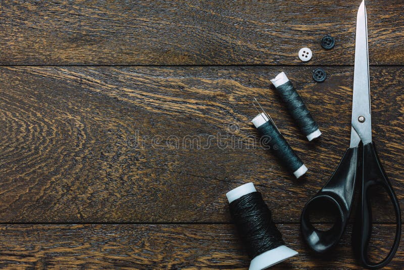Top view tailor items on wooden background. stock images