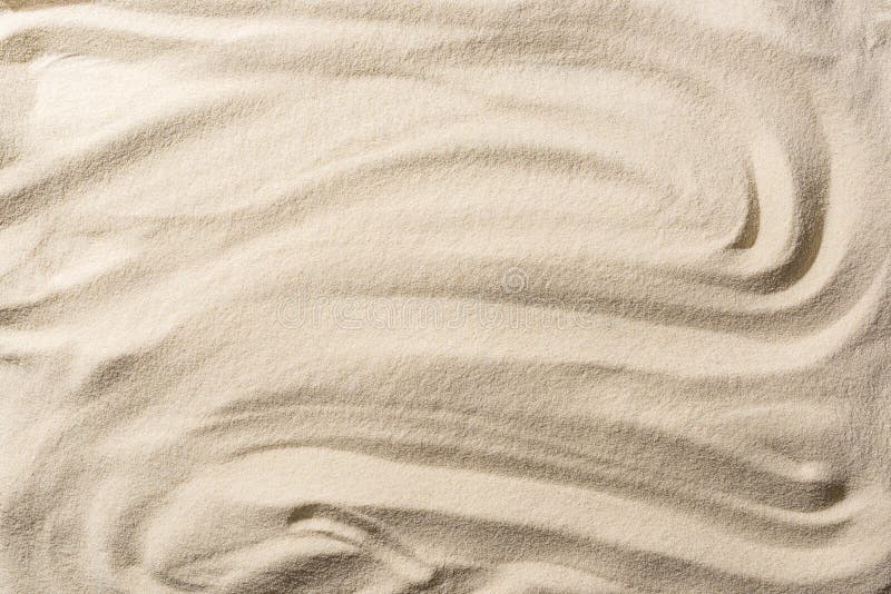 Top View Of Textured Sandy Beige Background With Smooth Waves Stock