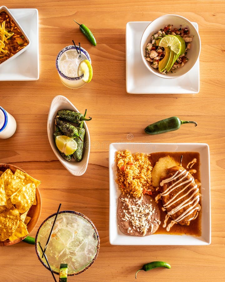 Top View of Three Mexican Dishes on a Wooden Table Stock Image Image of chili, avocado 235267293