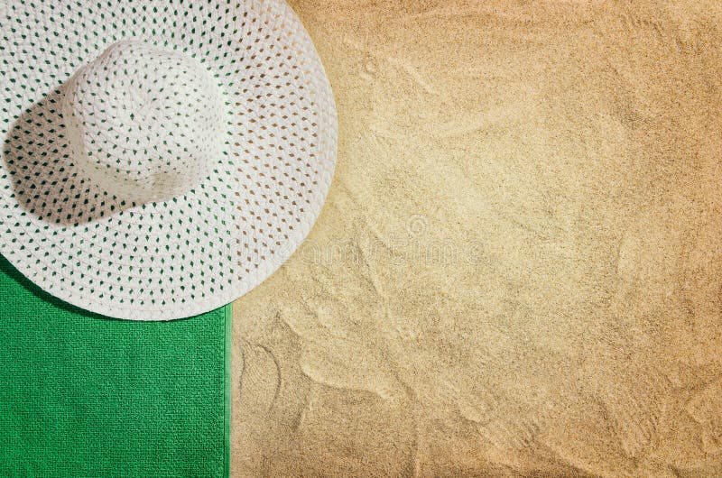 Top view towel on sandy beach. Background with copy space