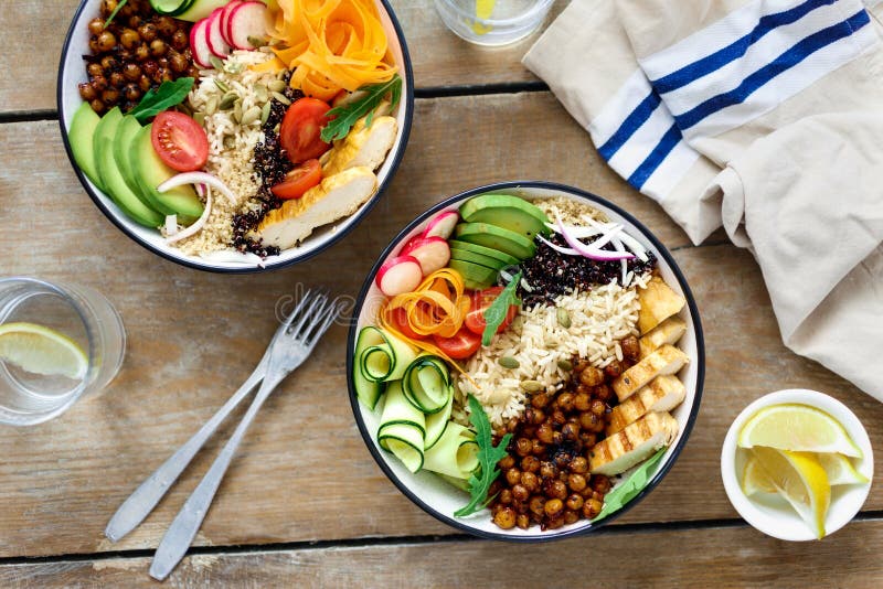 Top view two buddha bowl lemon water Clean balanced healthy food