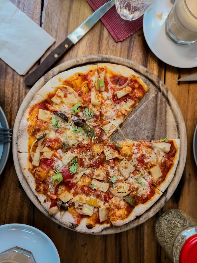 Top view-Vegetable pizza on a rustic wooden table royalty free stock image Top view-Vegetable pizza on a rustic wooden table royalty free stock image