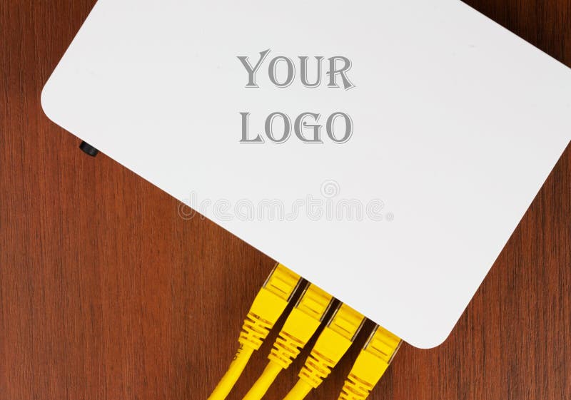 Top view on the wifi home router with 4 UTP RJ-45 patch cords stock photo