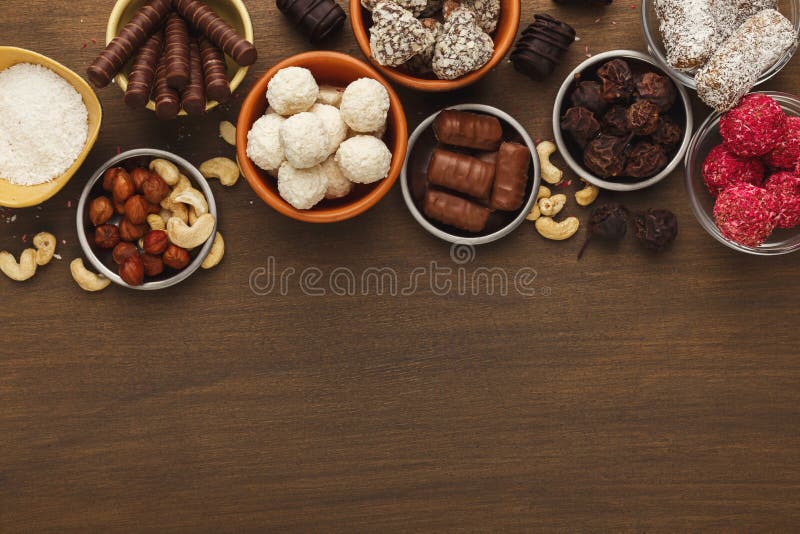 Wooden Desktop With Assortment Of Healthy Sweets And Nuts Stock